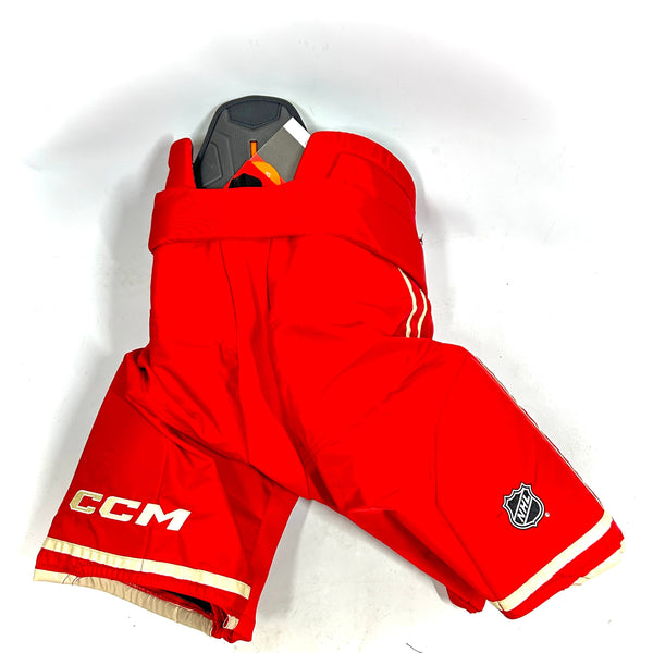 CCM HPTK - NHL Pro Stock Hockey Pants - Calgary Flames (Red/White)