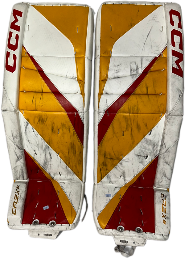 CCM Extreme Flex 6 - Used NHL Pro Stock Goalie Pads - Dustin Wolf (White/Yellow/Red)