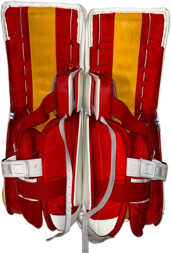 CCM Extreme Flex 6 - Used NHL Pro Stock Goalie Pads - Dustin Wolf (White/Yellow/Red)