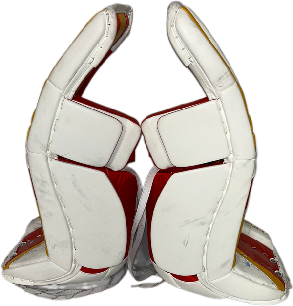 CCM Extreme Flex 6 - Used NHL Pro Stock Goalie Pads - Dustin Wolf (White/Yellow/Red)